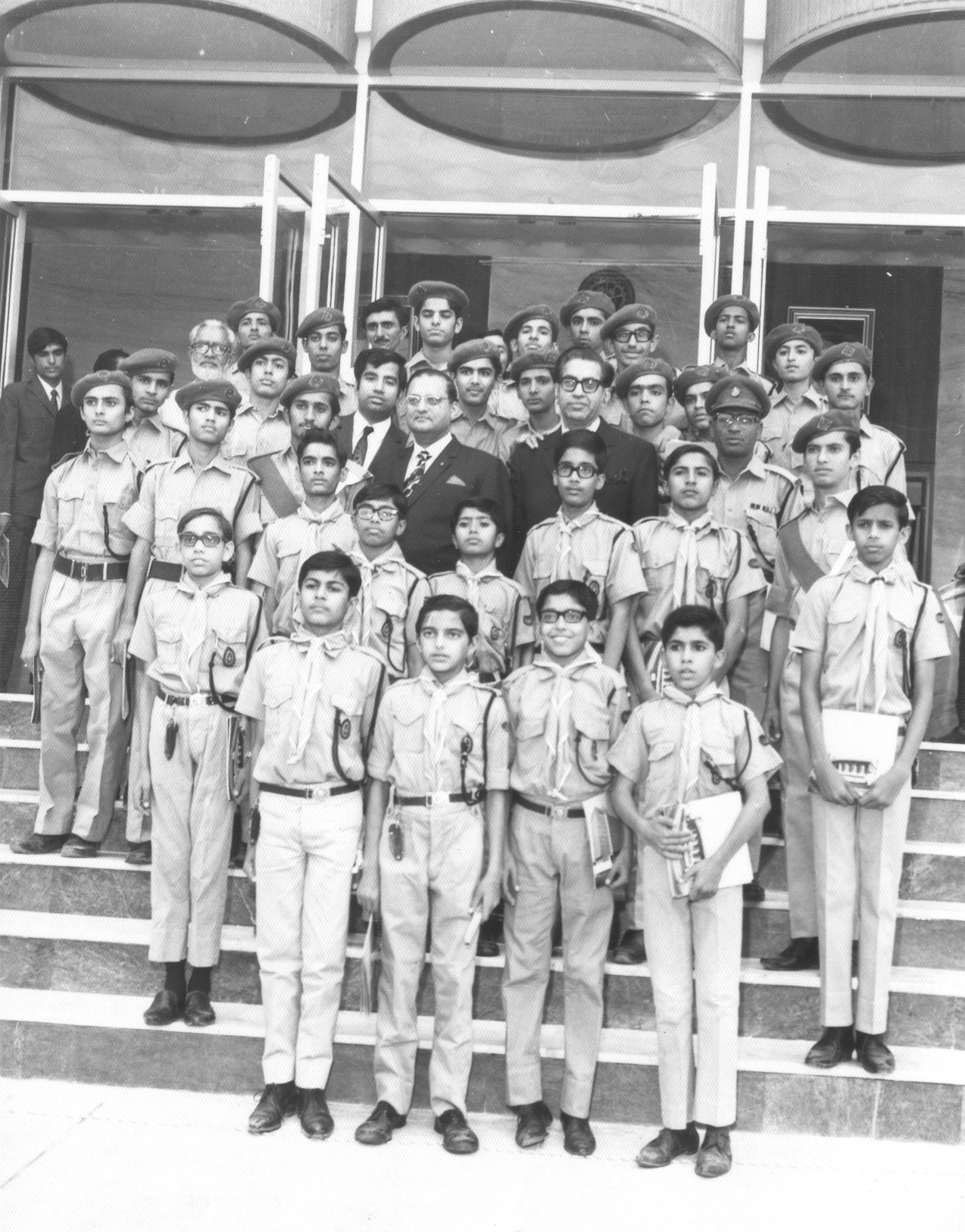 Mr. M A Rangoonwala, Mr. Sultan Mowjee and Mr. Salim Rangoonwala with Boys Scout